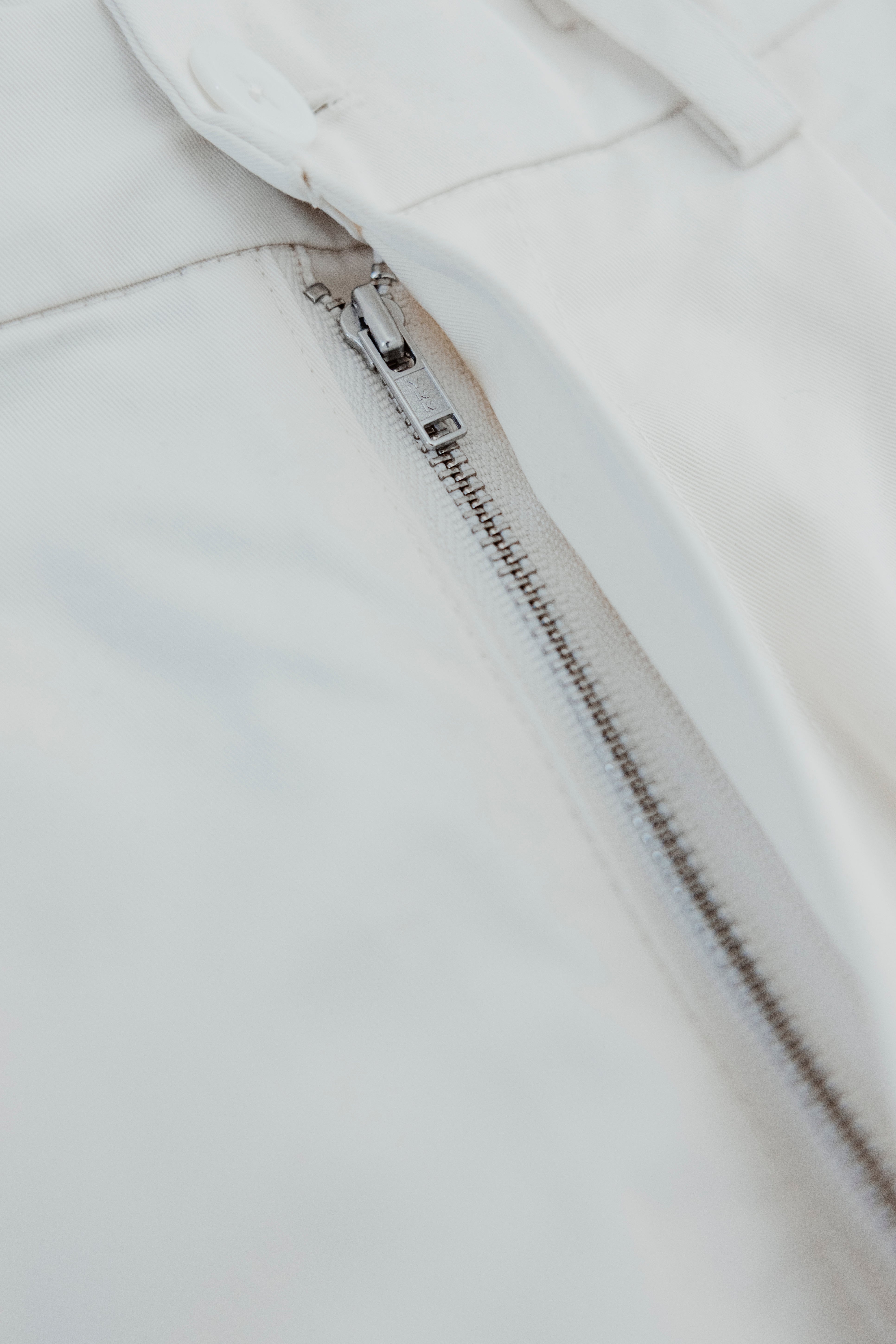 Bone Script Pleated Shorts